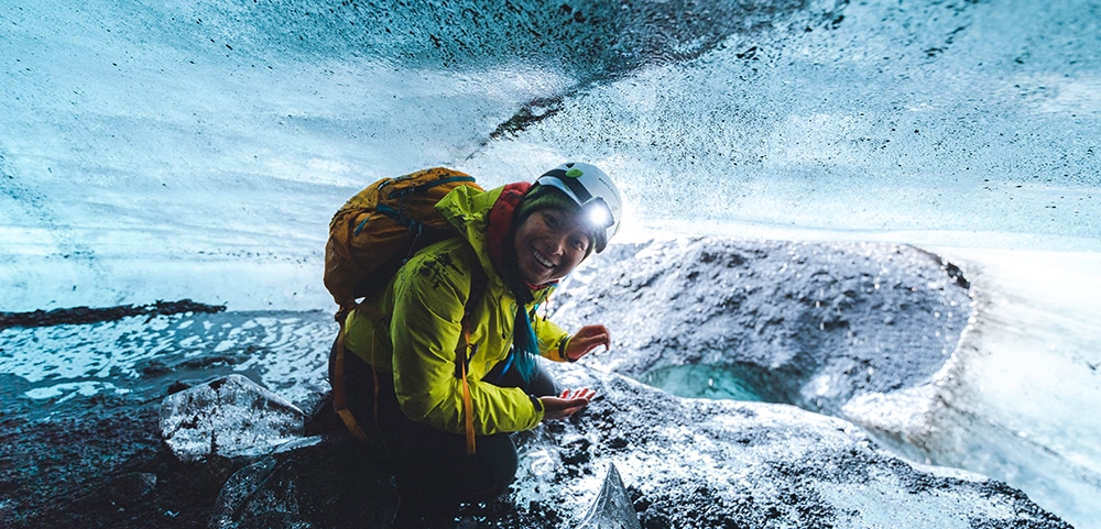 A person inside an ice cave in Iceland
