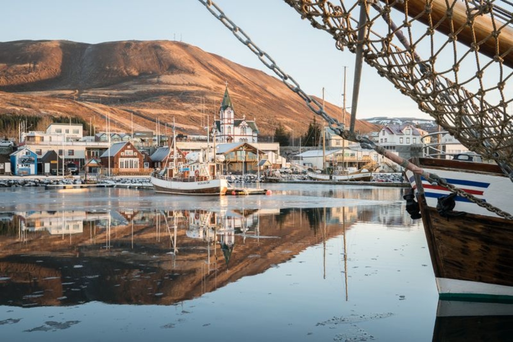 A port in Iceland featuring a stunning townscape.