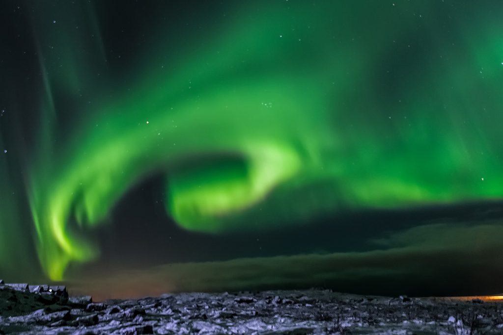 Green northern lights light up the sky in Iceland - Mice in Iceland